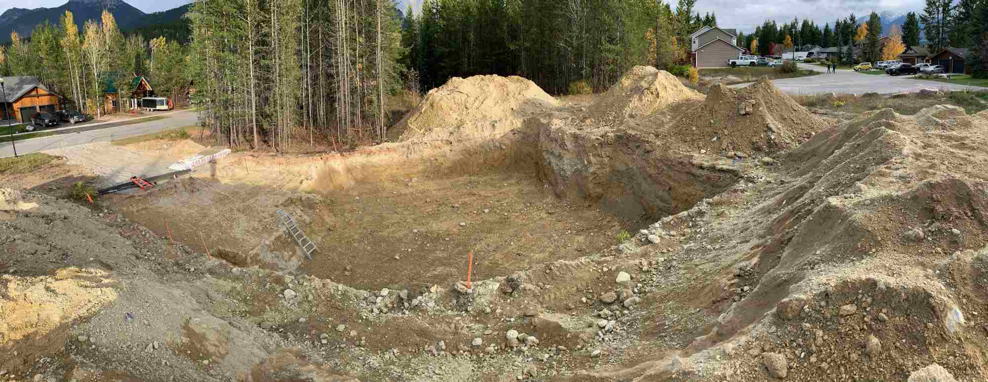 A plot of land that is dug out prior to construction.