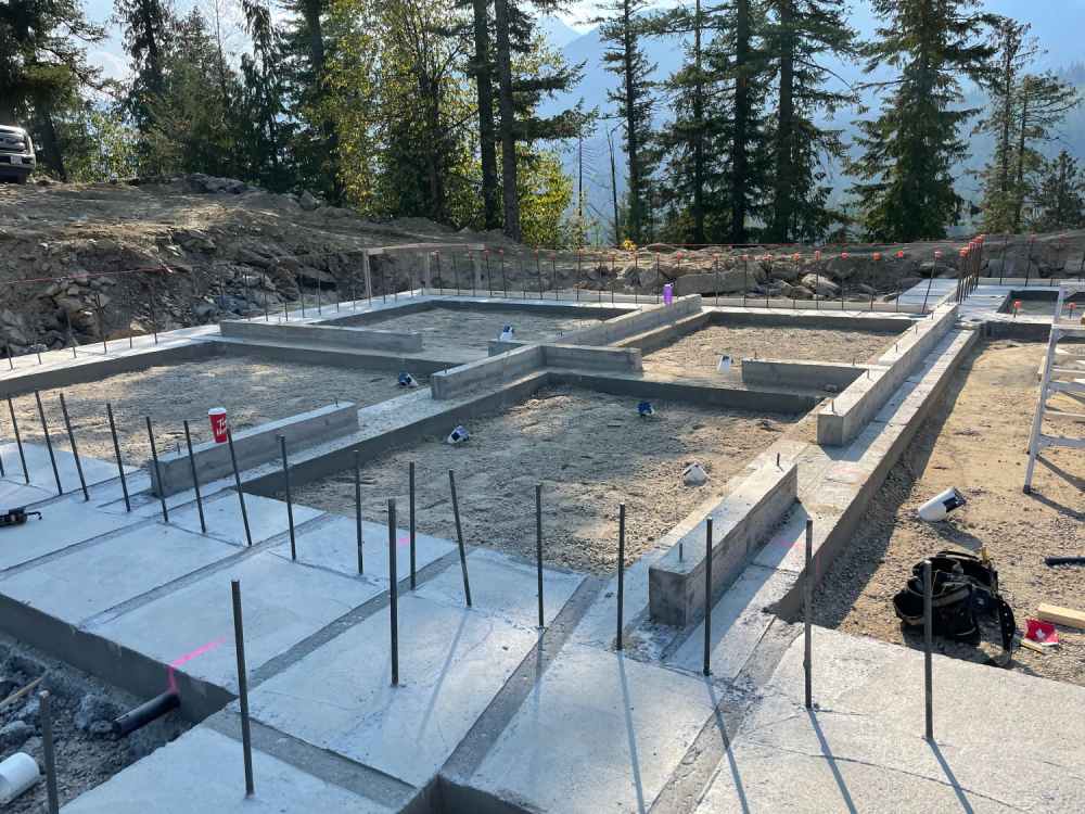 Concrete slabs for site preparation for residential home construction.